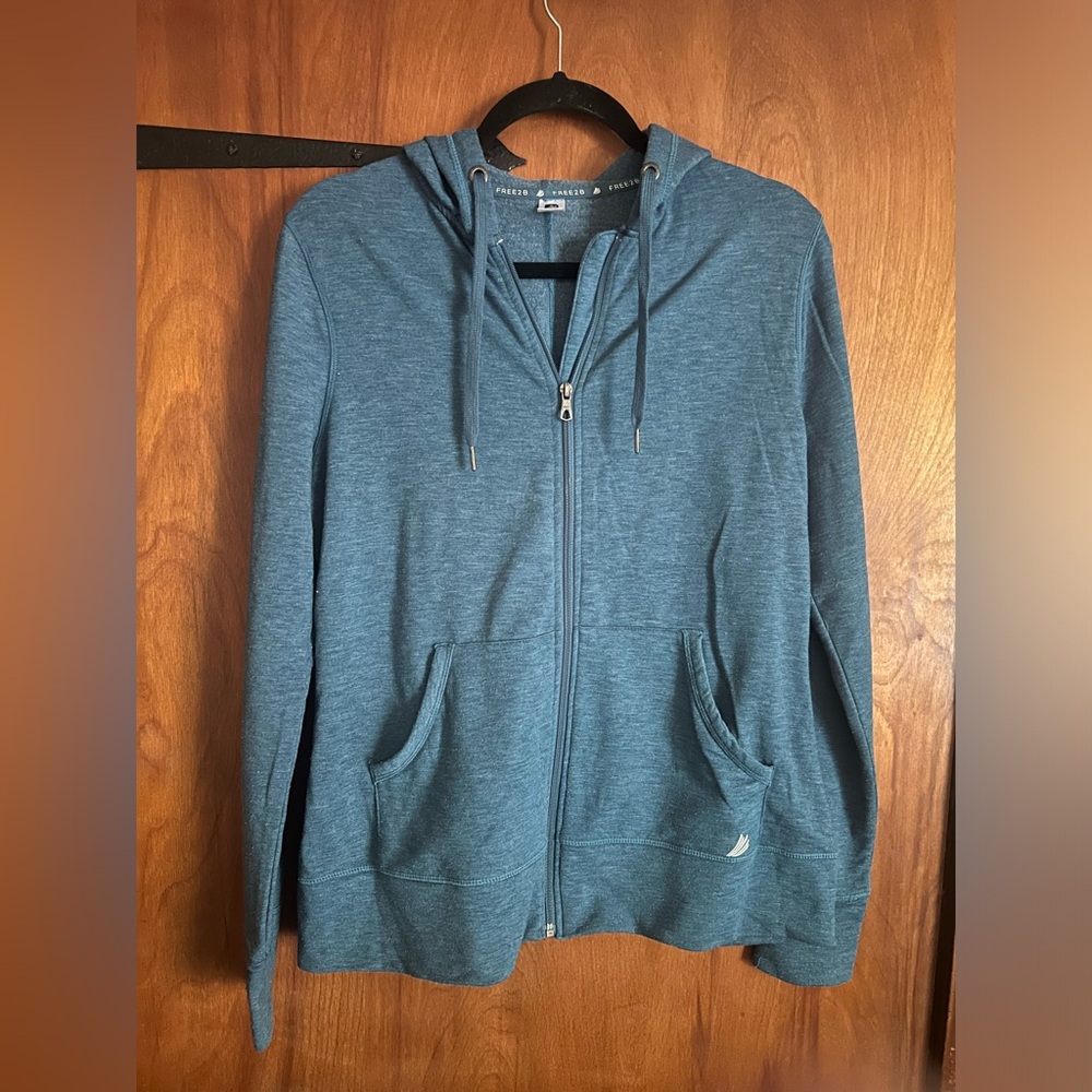 Light hooded sweatshirt blueish teal in color by Free2B size Lg